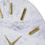 Horloge murale décorative en marbre avec détails en métal doré