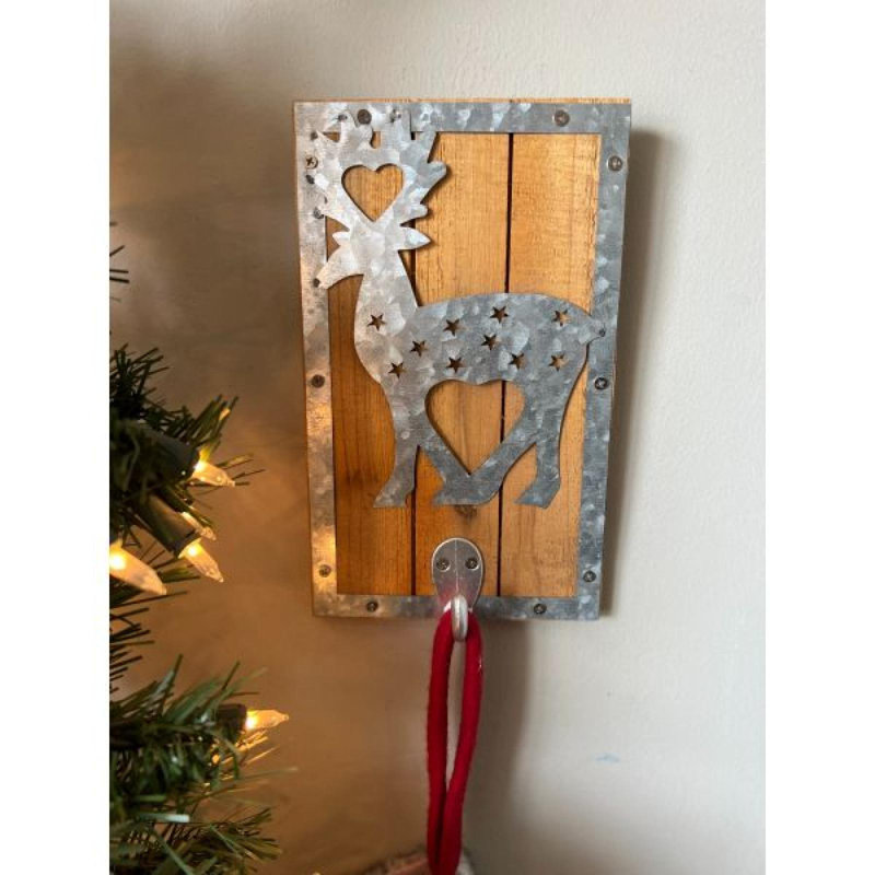 Metal Frame And Reindeer On Wood Background Wall Hook