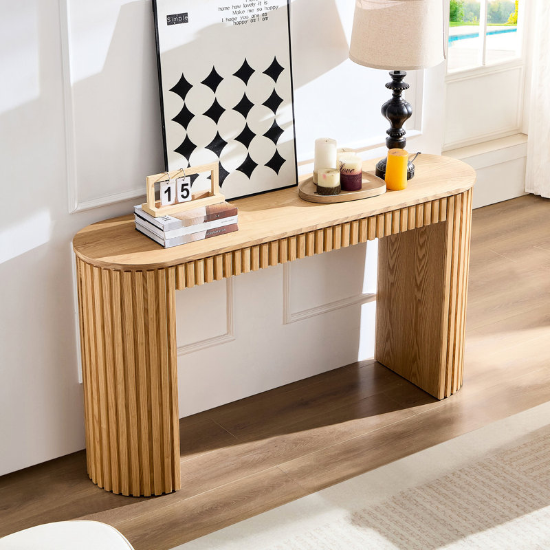 Table console incurvée en bois, 147 cm (57,93 po), design unique à rayures verticales, idéale pour le salon ou le couloir. Fabriquée en MDF naturel, elle est facile à assembler. Table incurvée de 147 cm (57,93 po) avec tiroir, design unique pour l'entrée ou le couloir.