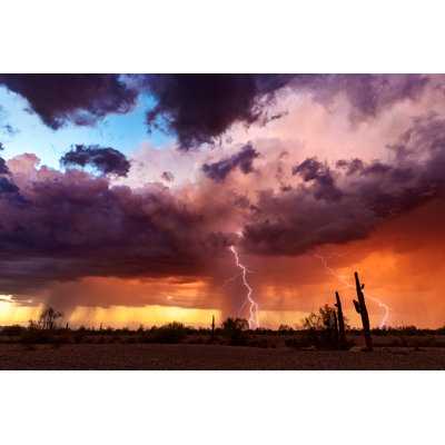 Lightning Strikes From A Sunset Storm In The Arizona Desert. - Wrapped Canvas Print
