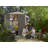 Keter Factor 6x6 ft. Durable Resin Outdoor Storage Shed With Floor and Double Doors for Garden Patio Furniture and Tools, Brown