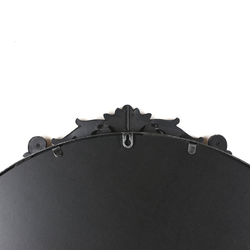 Miroir mural rond orné d'inspiration baroque, Noir