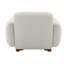 Fauteuil beige avec tissu et coussin décoratif attrayant