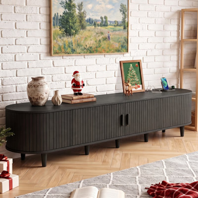 Meuble télé moderne de style Mid-Century 90 pouces avec prises électriques et étagères de rangement pouvant accueillir des téléviseurs jusqu'à 85 pouces, console multimédia en bois avec porte tambour pour salon et chambre, noir