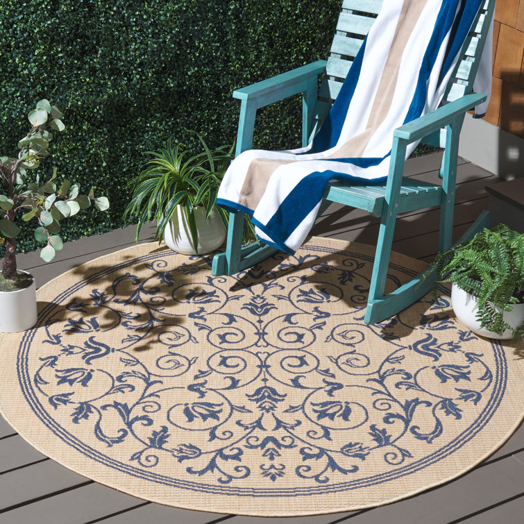 Arneshia Floral Tan/Blue Indoor/Outdoor Area Rug