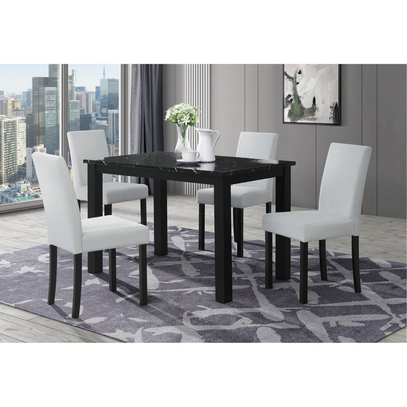 Table de salle à manger noire et (4) chaises de salle à manger argentées