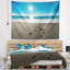 Tapisserie «Seascape Blue Sea» et empreintes de pas dans le sable-28488391