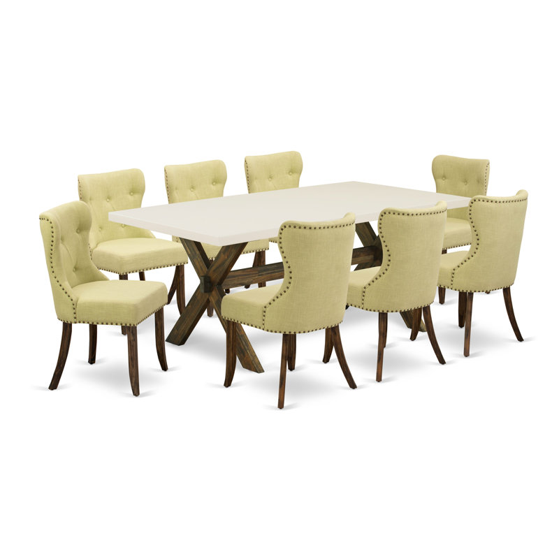 L'ensemble de mobilier de salle à manger 9 pièces comprend une table de salle à manger rectangulaire avec des pieds en X et 8 chaises rembourrées en tissu Linelight, finition jacobine patinée