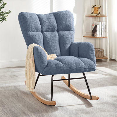 Fauteuil berçant et oscillant capitonné en tissu Teddy