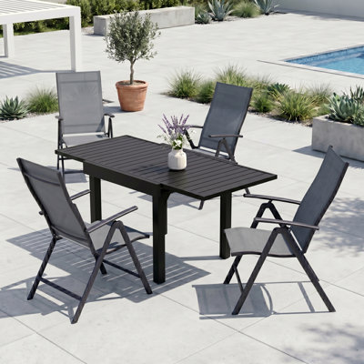 4 - Person Aluminum Extendable Outdoor Dining Set With Folded Adjustable Reclining Chairs