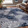 Chartier Machine Woven Floral Area Rug