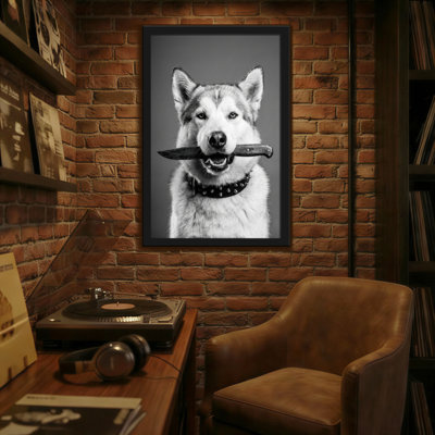 Animaux, chien tenant un couteau dans la bouche - noir et blanc