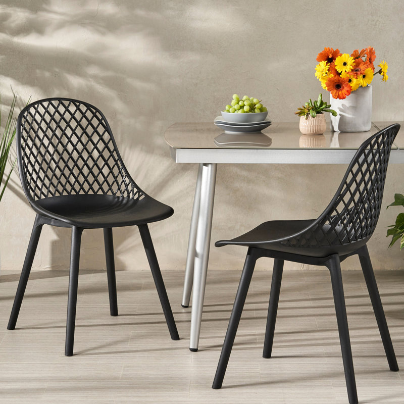 Chaise d'extérieur moderne - Chaise Lily en polypropylène noir avec structure et finition stables, matériau de la structure du siège