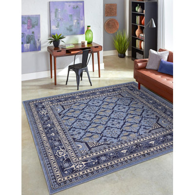 Tapis géométrique bleu / ivoire / bleu marine / bleu clair Hartle