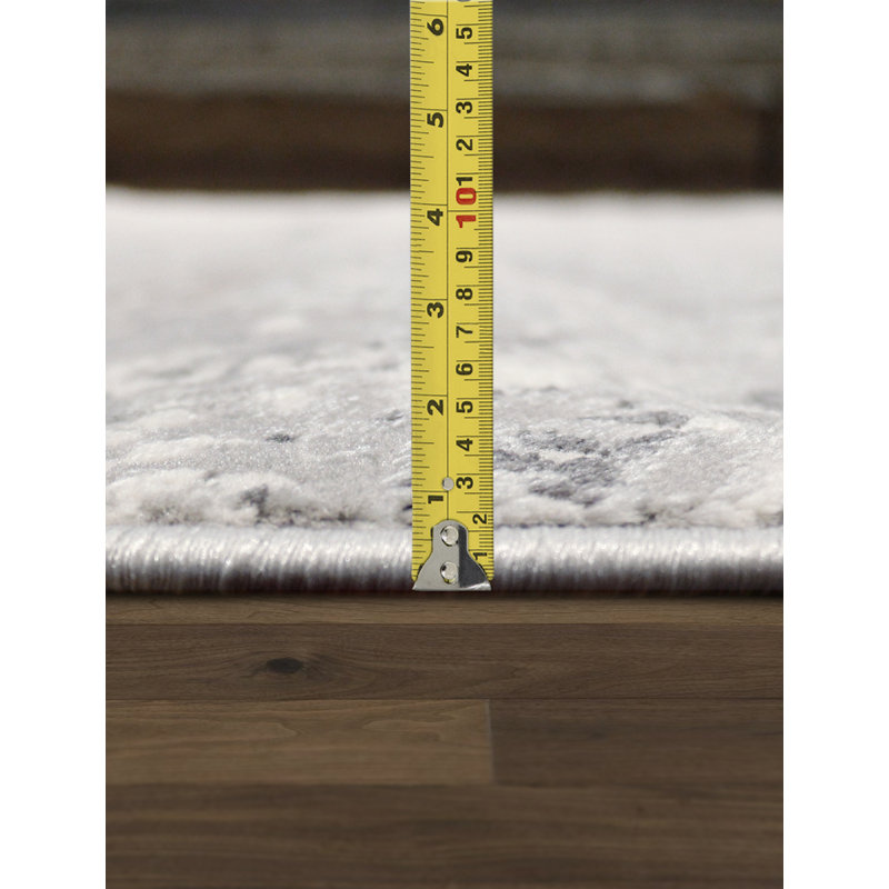 Round Gray and White Synthetic Abstract Area Rug