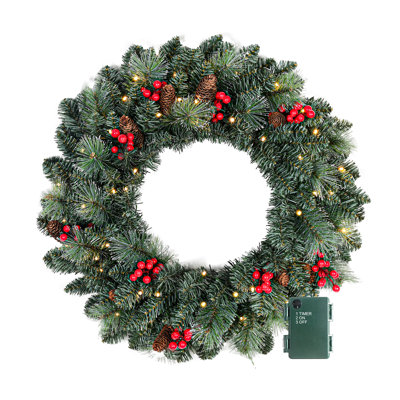Couronne de Noël 24 pouces pré-éclairée, couronne de pin artificielle à piles avec 50 lumières DEL blanc chaud, 146 pointes en PVC, baies rouges et pommes de pin pour la décoration de la porte d'entrée