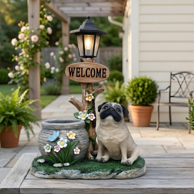 Statue de planteur de chien carlin assis