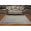 Élégant tapis minimaliste avec des motifs de bordure subtils 5 x 7