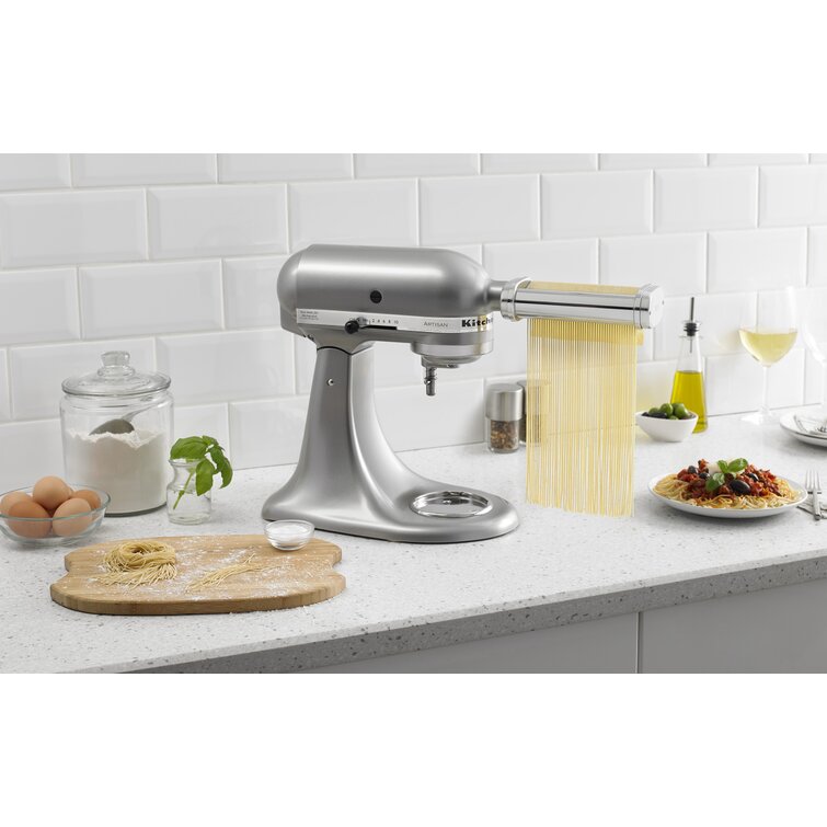 https://assets.wfcdn.com/im/47376139/resize-h755-w755%5Ecompr-r85/1016/101694100/KitchenAid%C2%AE+3-Piece+Pasta+Roller+%26+Cutter+Set.jpg