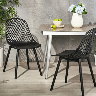 Fauteuil moderne d'extérieur Lily en polypropylène noir résistant aux intempéries Hauteur de l'assise extérieure en mailles losanges, paquet de 20,3