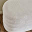 Deaysia 121cm Wide Oval Solid Colour Standard Ottoman with Storage
