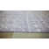 Tapis gris à motif géométrique