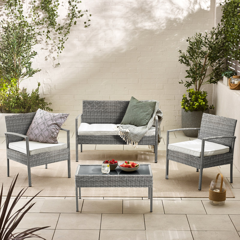 Ensemble de chaises et de table basse en rotin PE pour 4 personnes Kellsey - Jardin et patios