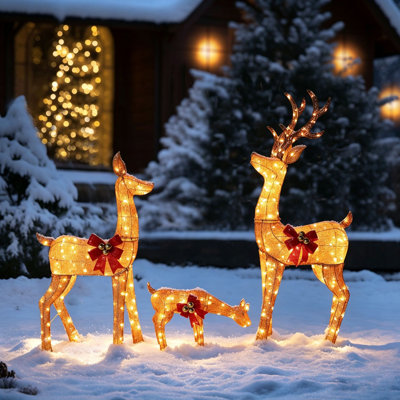 Décoration de Noël lumineuse des rennes, ensemble de 3 rennes animés avec piquets