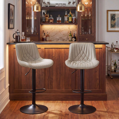 Tabouret de bar pivotant en similicuir Zager