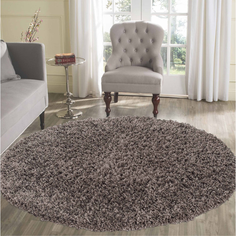 Esterly Shaggy Taupe Rug
