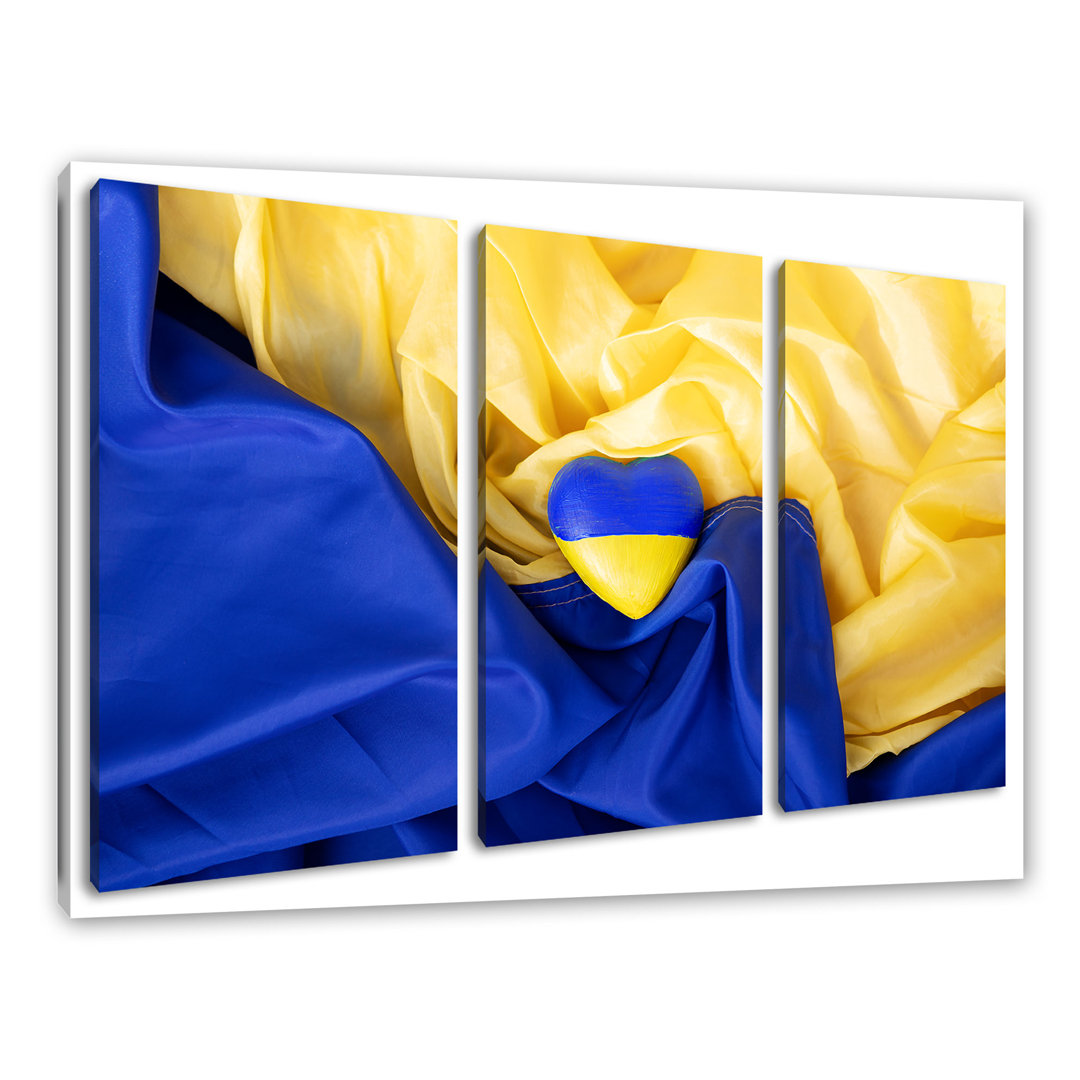 Leinwandbild Herz mit Ukraine-Flagge