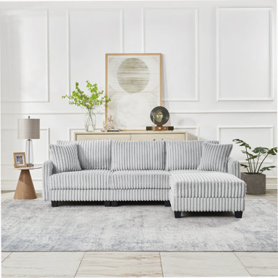L-Shaped Modular Corduroy Sofa With Dual USB Charging Ports And Freely Positionable Footrest For Modern Living Spaces.