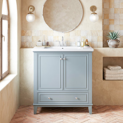 Meuble-lavabo autoportant à un lavabo, de couleur verte, avec comptoir en céramique intégré (robinetterie non incluse), dimensions : 51 cm (L) x 46 cm (P) x 86 cm (H).