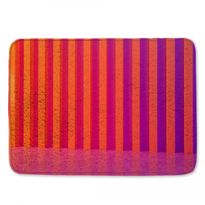 Tapis de bain orange à rayures mauves