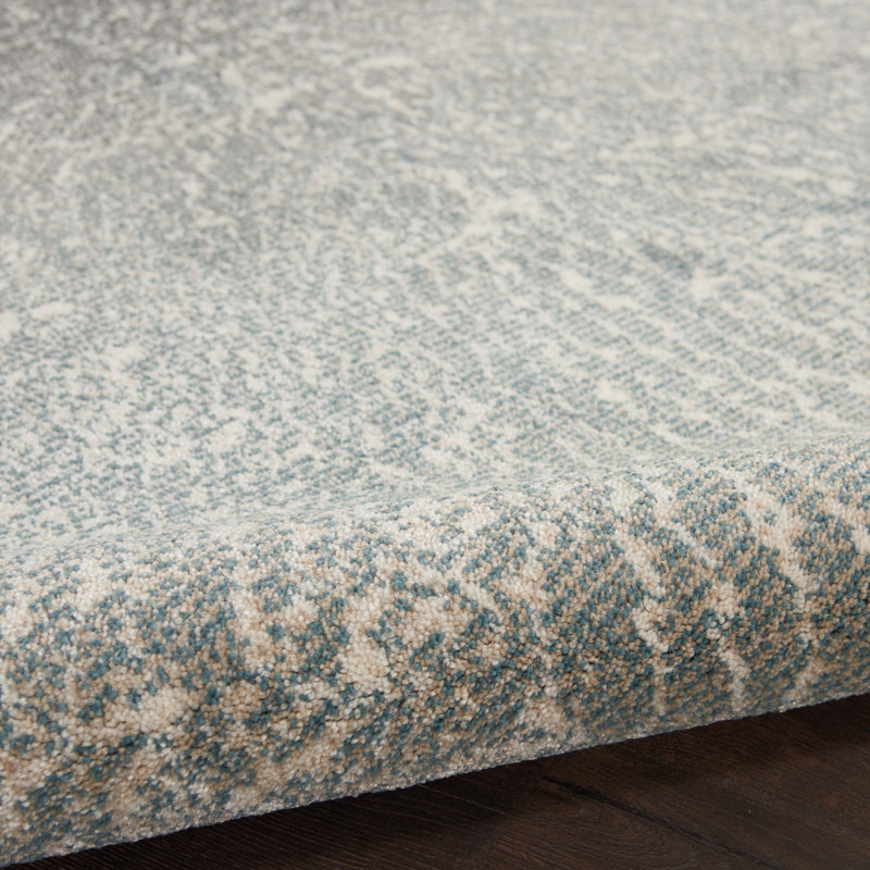 Abstract Elegance 70''x46'' Easy-Care Synthetic Area Rug in Grey