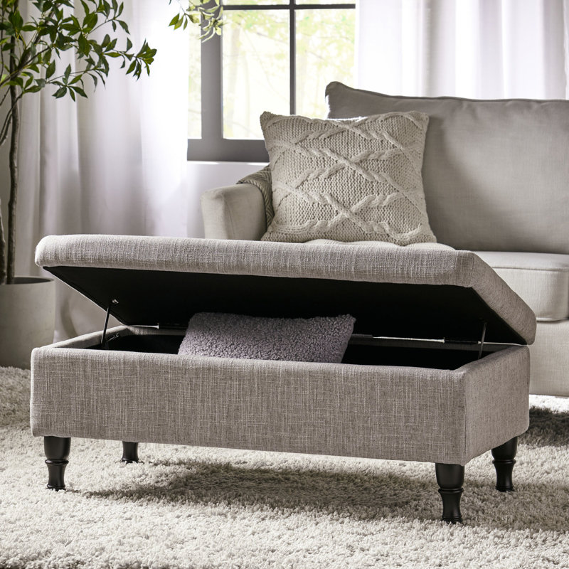 Housse gracieuse en tissu gris avec capitonnage et housse de rangement cachée