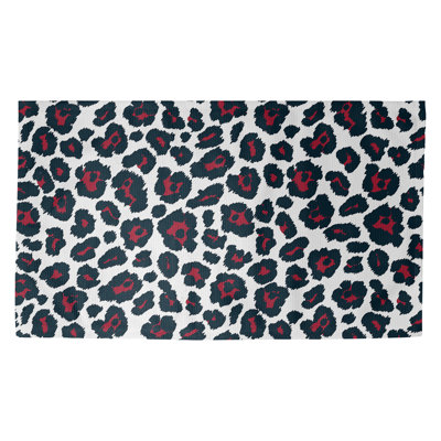 Tapis blanc / noir à imprimé animal