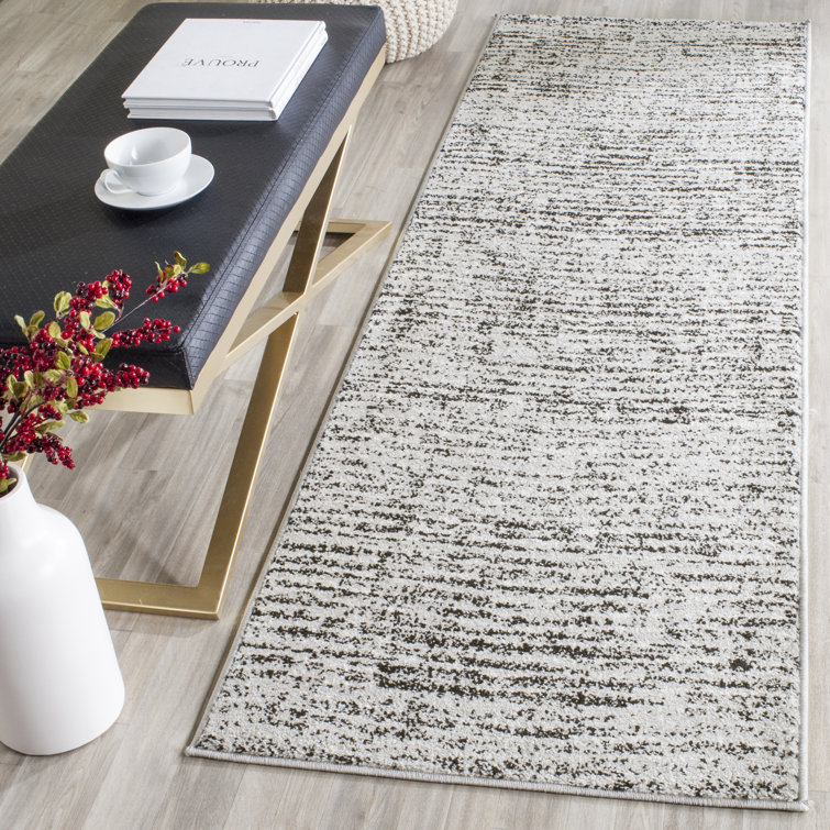 Riebe Abstract Black/Silver Area Rug