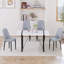 Ensemble de table de salle à manger 55 po en MDF moderne pour 4 personnes, ensemble de table et de chaises avec pieds en métal noir pour cuisine, plateau de table rectangulaire blanc industriel et chaises de salle à manger rembourrées en polyuréthane épais