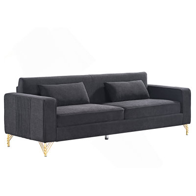 Luxueux canapé en velours pour le salon, rehaussant le confort et le style