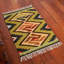Wool Chevron / Zig Zag Area Rug in Green/Beige