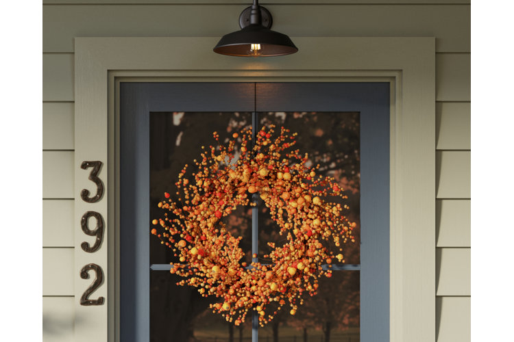 fall front door with a festive wreath