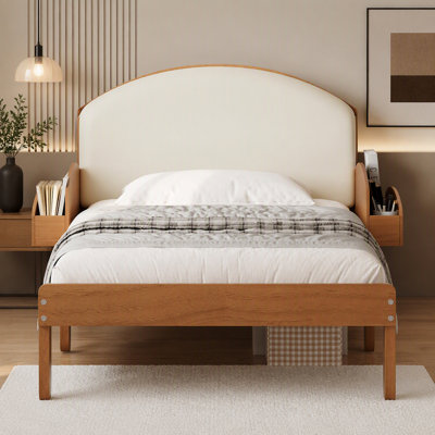 Lit simple avec tête de lit rembourrée et tablettes