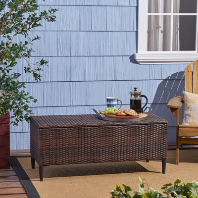 Banc de rangement en rotin pour l'extérieur