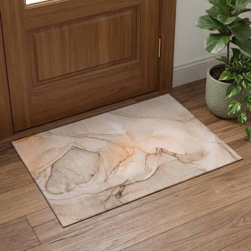 3' X 5' Orange And Ivory Abstract Washable Area Rug With UV Protection