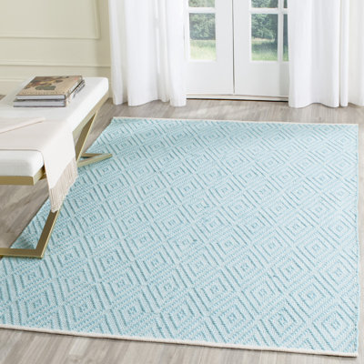 Tapis bleu en coton tissé à plat à la main à motif géométrique Haq moule