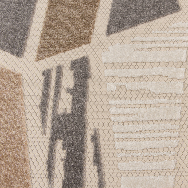 Ivory and Taupe Geometric 5' x 7' Synthetic Area Rug