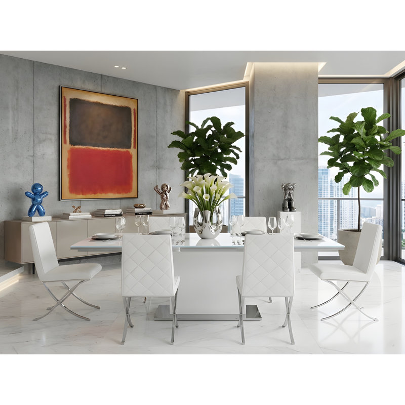 Table de salle à manger Bianca avec base blanche et plateau blanc.