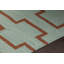 Tapis en laine et en coton à chevrons tissé à plat à la main à motif géométrique vert et orange Chevella-465139245