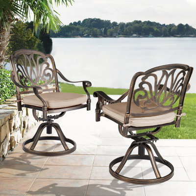 Vaidya Swivel Patio Dining Armchair with Cushion by Bloomsbury Market
